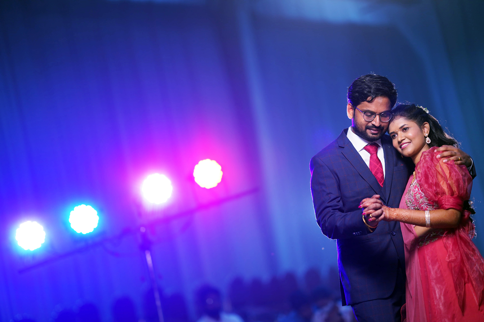 romantic couple dance event night Hyderabad colorful lights wedding reception