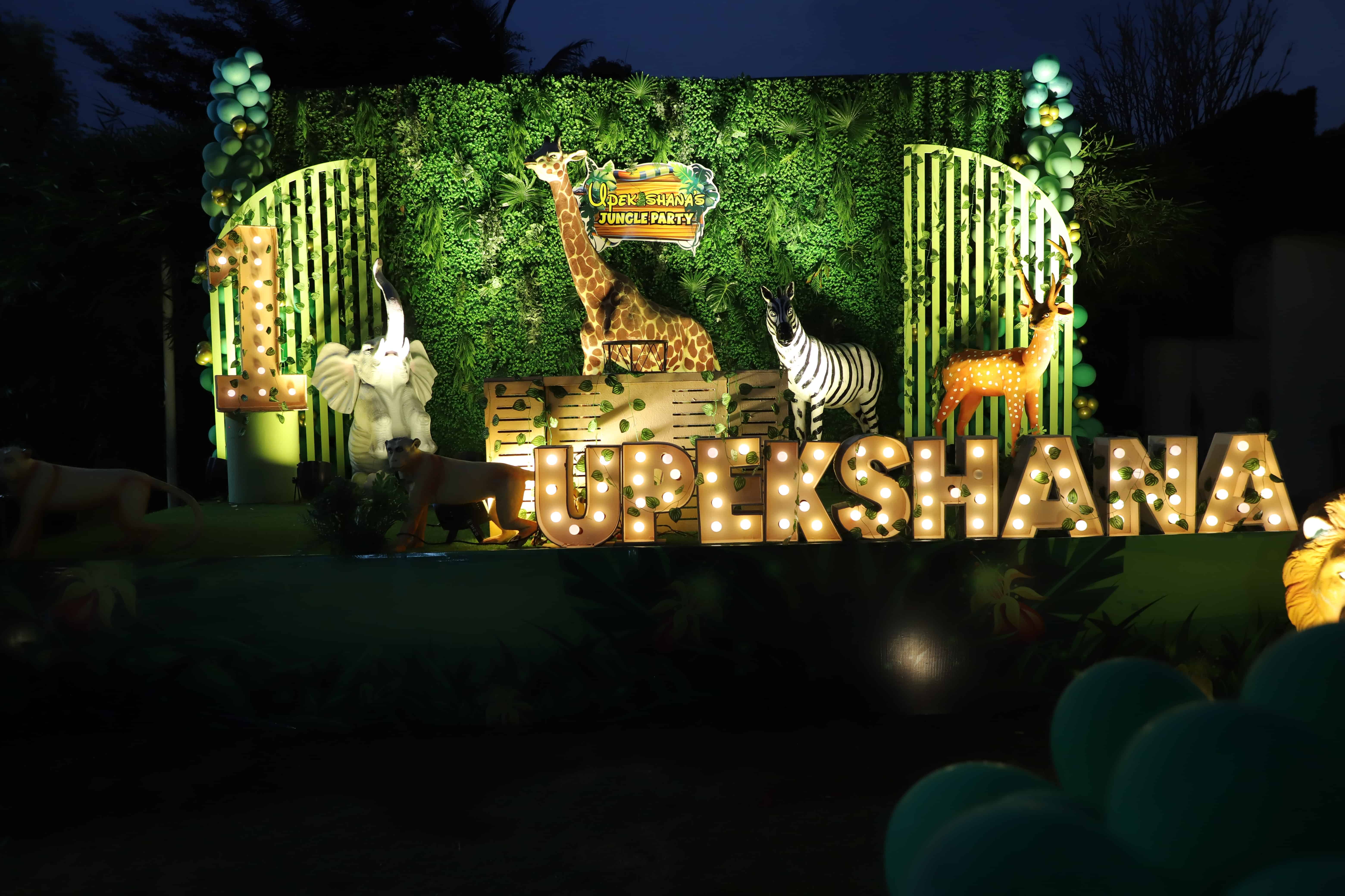 jungle theme birthday decoration night Hyderabad kids party event setup animals stage lighting