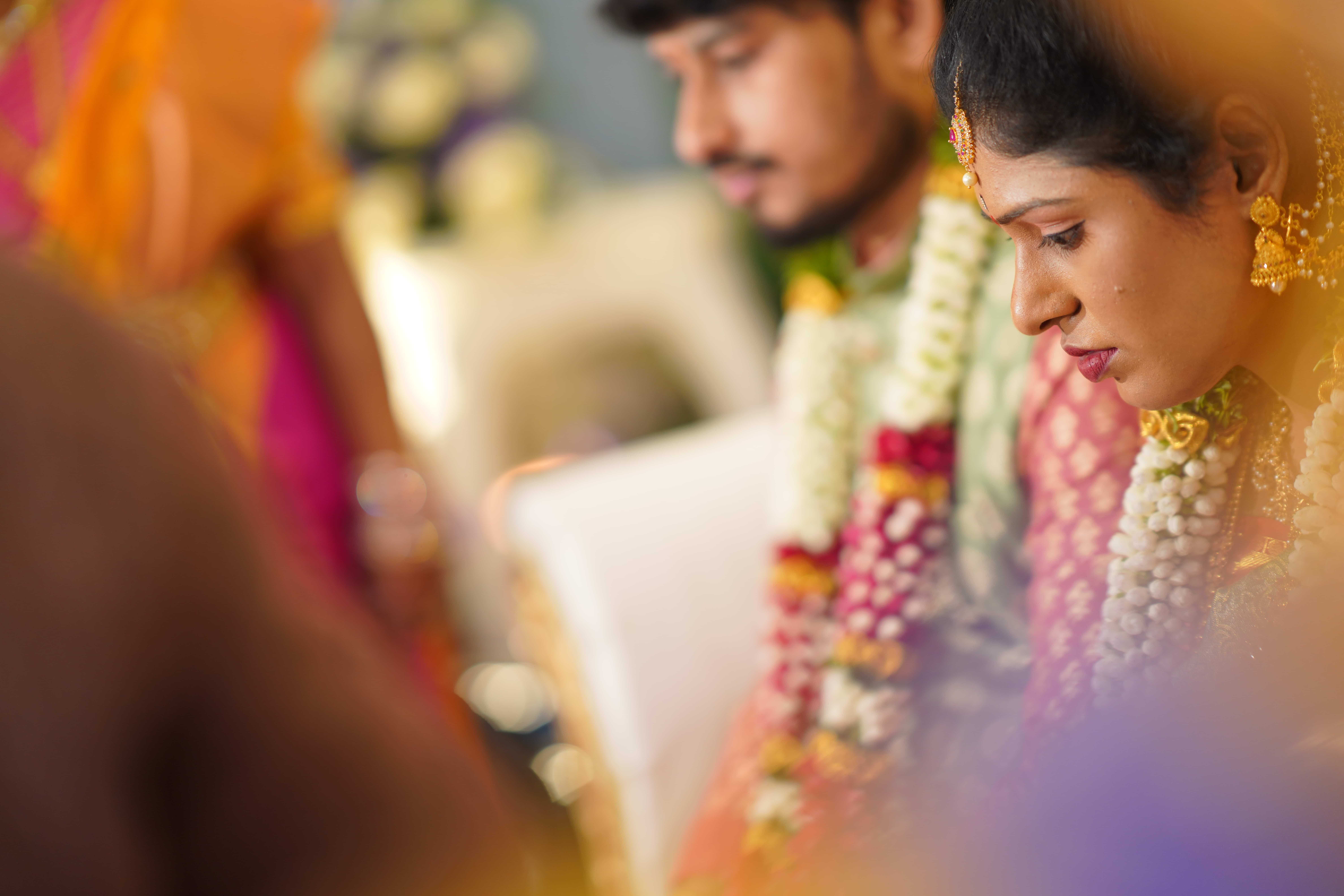 south indian wedding ritual closeup bride groom